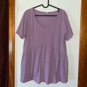 Large light purple shirt.